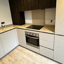 cleaned kitchen cabinets stove and floor